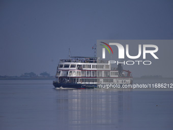 Tourists ride in M.V. Mahabaahu Cruise on the Brahmaputra River in Morigaon District, Assam, India, on October 20, 2024. (