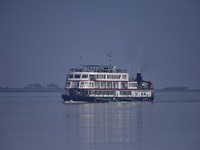 Tourists ride in M.V. Mahabaahu Cruise on the Brahmaputra River in Morigaon District, Assam, India, on October 20, 2024. (