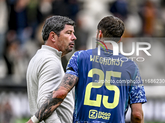 Heracles Almelo trainer Erwin van de Looi and AFC Ajax Amsterdam forward Wout Weghorst participate in the match between Heracles Almelo and...