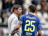 Heracles Almelo trainer Erwin van de Looi and AFC Ajax Amsterdam forward Wout Weghorst participate in the match between Heracles Almelo and...