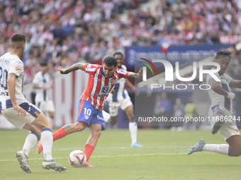 Angel Correa of Atletico de Madrid attempts a shot during the La Liga 2024/25 match between Atletico de Madrid and Leganes at Riyadh Air Met...