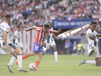 Angel Correa of Atletico de Madrid attempts a shot during the La Liga 2024/25 match between Atletico de Madrid and Leganes at Riyadh Air Met...