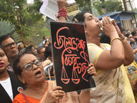 Citizens of Kolkata protest over the sexual assault and murder of a postgraduate woman doctor in Kolkata, India, on October 20, 2024. (