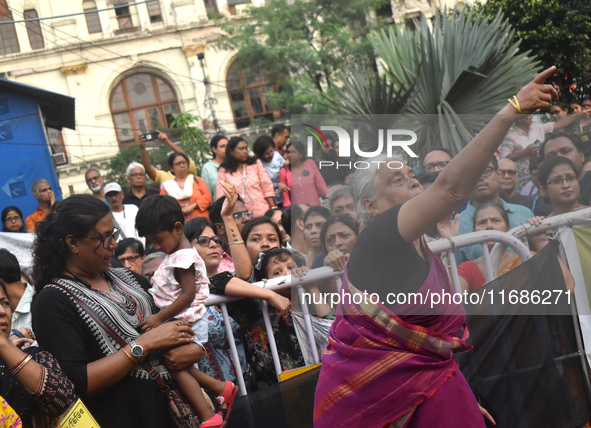 Citizens shout slogans while they attend the Junior Doctors hunger strike to protest the rape and murder case of a medic in a government-run...