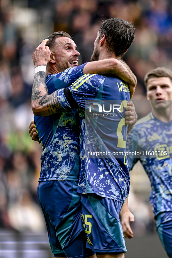 AFC Ajax Amsterdam midfielder Jordan Henderson and forward Wout Weghorst celebrate the 3-4 goal during the match between Heracles Almelo and...