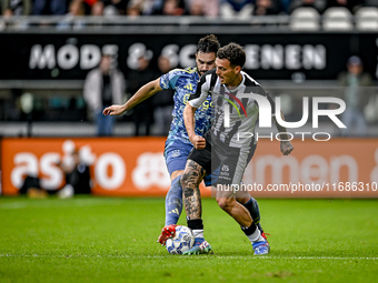 AFC Ajax Amsterdam defender Josip Sutalo and Heracles Almelo forward Jizz Hornkamp participate in the match between Heracles Almelo and Ajax...