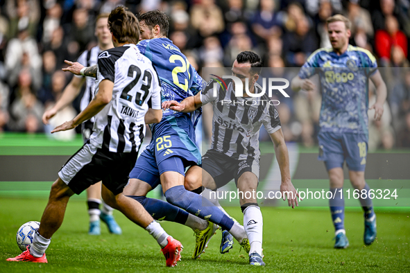 AFC Ajax Amsterdam forward Wout Weghorst and Heracles Almelo midfielder Thomas Bruns give away a penalty during the match between Heracles A...