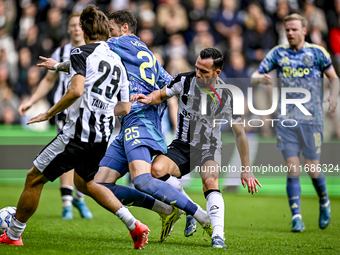 AFC Ajax Amsterdam forward Wout Weghorst and Heracles Almelo midfielder Thomas Bruns give away a penalty during the match between Heracles A...