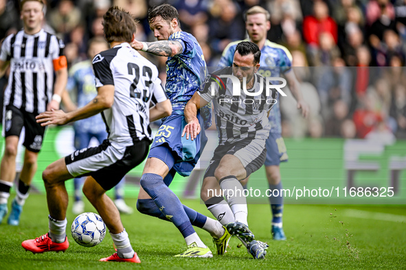 AFC Ajax Amsterdam forward Wout Weghorst and Heracles Almelo midfielder Thomas Bruns give away a penalty during the match between Heracles A...