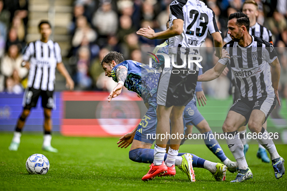 AFC Ajax Amsterdam forward Wout Weghorst and Heracles Almelo midfielder Thomas Bruns give away a penalty during the match between Heracles A...