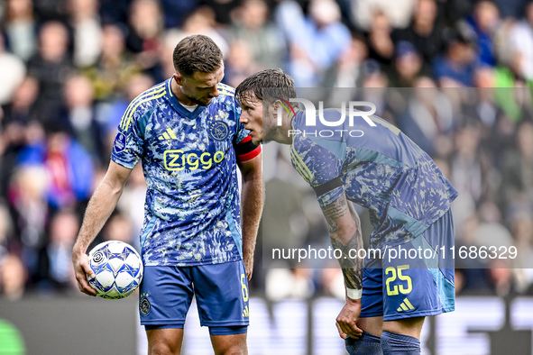 AFC Ajax Amsterdam midfielder Jordan Henderson and AFC Ajax Amsterdam forward Wout Weghorst discuss who takes the penalty during the match b...