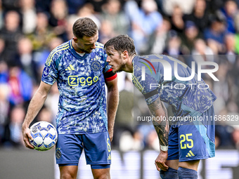 AFC Ajax Amsterdam midfielder Jordan Henderson and AFC Ajax Amsterdam forward Wout Weghorst discuss who takes the penalty during the match b...