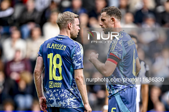 AFC Ajax Amsterdam midfielder Jordan Henderson and AFC Ajax Amsterdam midfielder Davy Klaassen discuss who takes the penalty during the matc...