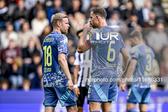 AFC Ajax Amsterdam midfielder Jordan Henderson and AFC Ajax Amsterdam midfielder Davy Klaassen discuss who takes the penalty during the matc...