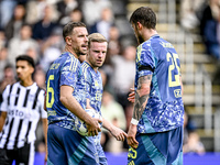 AFC Ajax Amsterdam midfielder Jordan Henderson, midfielder Davy Klaassen, and forward Wout Weghorst discuss who takes the penalty during the...