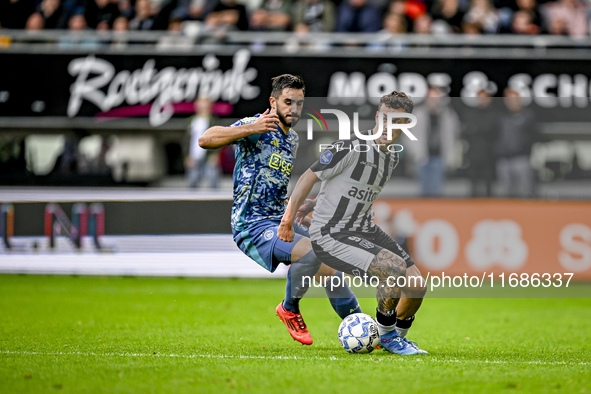 AFC Ajax Amsterdam defender Josip Sutalo and Heracles Almelo forward Jizz Hornkamp participate in the match between Heracles Almelo and Ajax...