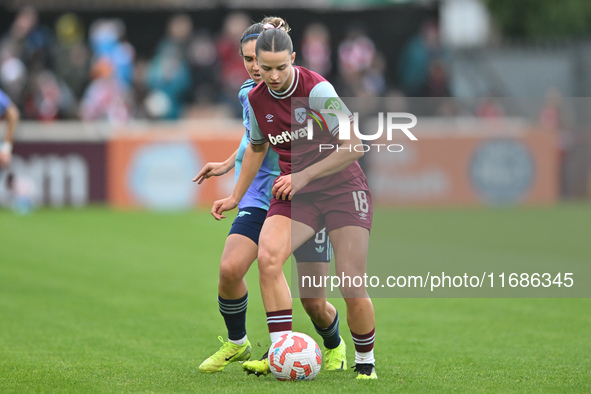 Anouk Denton, 18, of West Ham, controls the ball during the Barclays FA Women's Super League match between West Ham United and Arsenal at th...