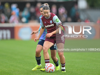 Anouk Denton, 18, of West Ham, controls the ball during the Barclays FA Women's Super League match between West Ham United and Arsenal at th...