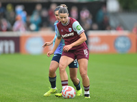 Anouk Denton, 18, of West Ham, controls the ball during the Barclays FA Women's Super League match between West Ham United and Arsenal at th...