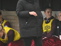 Manager Rehanne Skinner observes during the Barclays FA Women's Super League match between West Ham United and Arsenal at the Chigwell Const...