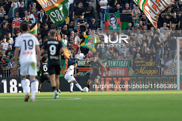 Antonio Candela of Venezia competes against Juan Cuadrado of Atalanta during the Italian Serie A soccer match between Venezia FC and Atalant...