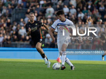 Atalanta's Berat Djimsiti plays against Venezia's Christian Gytkjaer during the Italian Serie A soccer championship match between Venezia FC...