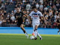 Atalanta's Berat Djimsiti plays against Venezia's Christian Gytkjaer during the Italian Serie A soccer championship match between Venezia FC...