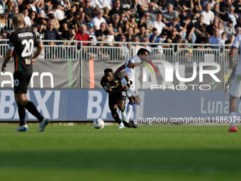 John Yeboah of Venezia plays against Juan Cuadrado of Atalanta during the Italian Serie A soccer championship match between Venezia FC and A...