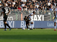 John Yeboah of Venezia plays against Juan Cuadrado of Atalanta during the Italian Serie A soccer championship match between Venezia FC and A...