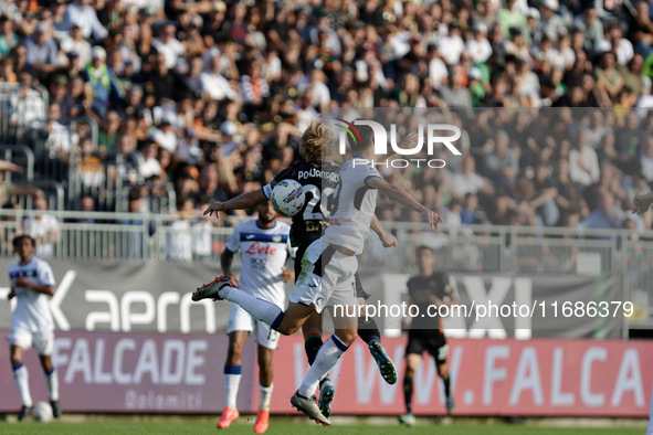 Joel Pohjanpalo of Venezia plays against Berat Djimsiti of Atalanta during the Italian Serie A soccer match between Venezia FC and Atalanta...