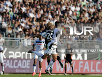 Joel Pohjanpalo of Venezia plays against Berat Djimsiti of Atalanta during the Italian Serie A soccer match between Venezia FC and Atalanta...