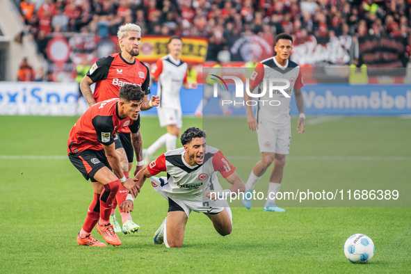 Omar Marmoush of Eintracht Frankfurt plays against Piero Hincapie of Bayer 04 Leverkusen during the Bundesliga match between Bayer 04 Leverk...