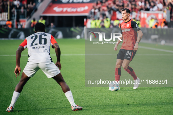 Granit Xhaka of Bayer 04 Leverkusen plays the ball during the Bundesliga match between Bayer 04 Leverkusen and Eintracht Frankfurt at BayAre...