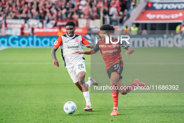 Amine Adli of Bayer 04 Leverkusen plays against Junior Dina Ebimbe of Eintracht Frankfurt during the Bundesliga match between Bayer 04 Lever...