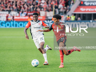 Amine Adli of Bayer 04 Leverkusen plays against Junior Dina Ebimbe of Eintracht Frankfurt during the Bundesliga match between Bayer 04 Lever...