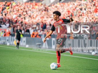 Amine Adli of Bayer 04 Leverkusen plays the ball during the Bundesliga match between Bayer 04 Leverkusen and Eintracht Frankfurt at BayArena...