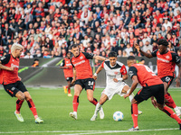 Omar Marmoush of Eintracht Frankfurt plays against Jonathan Tah, Edmond Tapsoba, Granit Xhaka, and Robert Andrich of Bayer 04 Leverkusen dur...