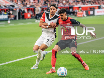 Omar Marmoush of Eintracht Frankfurt plays against Piero Hincapie of Bayer 04 Leverkusen during the Bundesliga match between Bayer 04 Leverk...