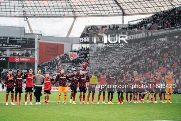 Players of Bayer 04 Leverkusen celebrate with fans after the Bundesliga match between Bayer 04 Leverkusen and Eintracht Frankfurt at BayAren...