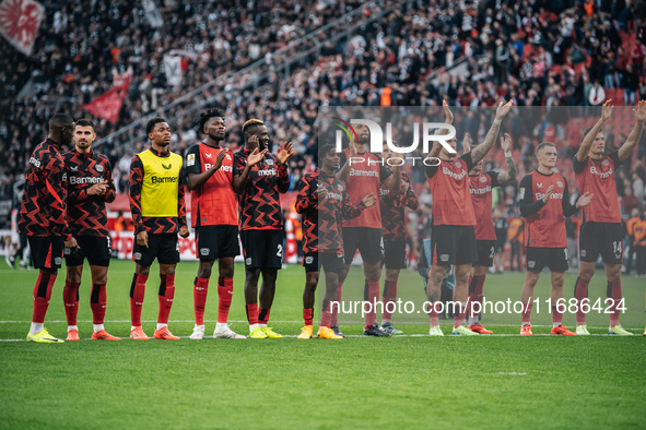 Players of Bayer 04 Leverkusen celebrate with fans after the Bundesliga match between Bayer 04 Leverkusen and Eintracht Frankfurt at BayAren...