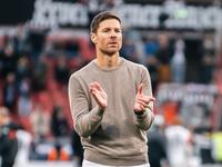 Xabi Alonso, Head Coach of Bayer 04 Leverkusen, celebrates with fans after the Bundesliga match between Bayer 04 Leverkusen and Eintracht Fr...