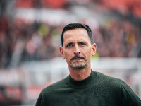 Dino Toppmoeller, Head Coach of Eintracht Frankfurt, looks on prior to the Bundesliga match between Bayer 04 Leverkusen and Eintracht Frankf...