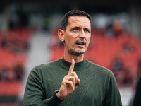 Dino Toppmoeller, Head Coach of Eintracht Frankfurt, looks on prior to the Bundesliga match between Bayer 04 Leverkusen and Eintracht Frankf...