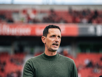 Dino Toppmoeller, Head Coach of Eintracht Frankfurt, looks on prior to the Bundesliga match between Bayer 04 Leverkusen and Eintracht Frankf...