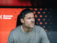 Xabi Alonso, Head Coach of Bayer 04 Leverkusen, looks on before the Bundesliga match between Bayer 04 Leverkusen and Eintracht Frankfurt at...