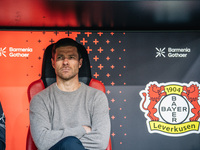 Xabi Alonso, Head Coach of Bayer 04 Leverkusen, looks on before the Bundesliga match between Bayer 04 Leverkusen and Eintracht Frankfurt at...