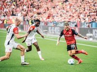 Alejandro Grimaldo of Bayer 04 Leverkusen is in action during the Bundesliga match between Bayer 04 Leverkusen and Eintracht Frankfurt at Ba...