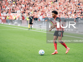 Amine Adli of Bayer 04 Leverkusen is in action during the Bundesliga match between Bayer 04 Leverkusen and Eintracht Frankfurt at BayArena i...