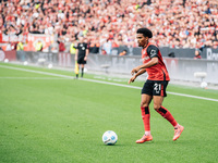 Amine Adli of Bayer 04 Leverkusen is in action during the Bundesliga match between Bayer 04 Leverkusen and Eintracht Frankfurt at BayArena i...