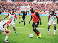 Victor Boniface of Bayer 04 Leverkusen is in action during the Bundesliga match between Bayer 04 Leverkusen and Eintracht Frankfurt at BayAr...